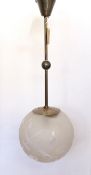 A 1930's French Art Deco brass mounted frosted glass ceiling light by Deveau, decorated with