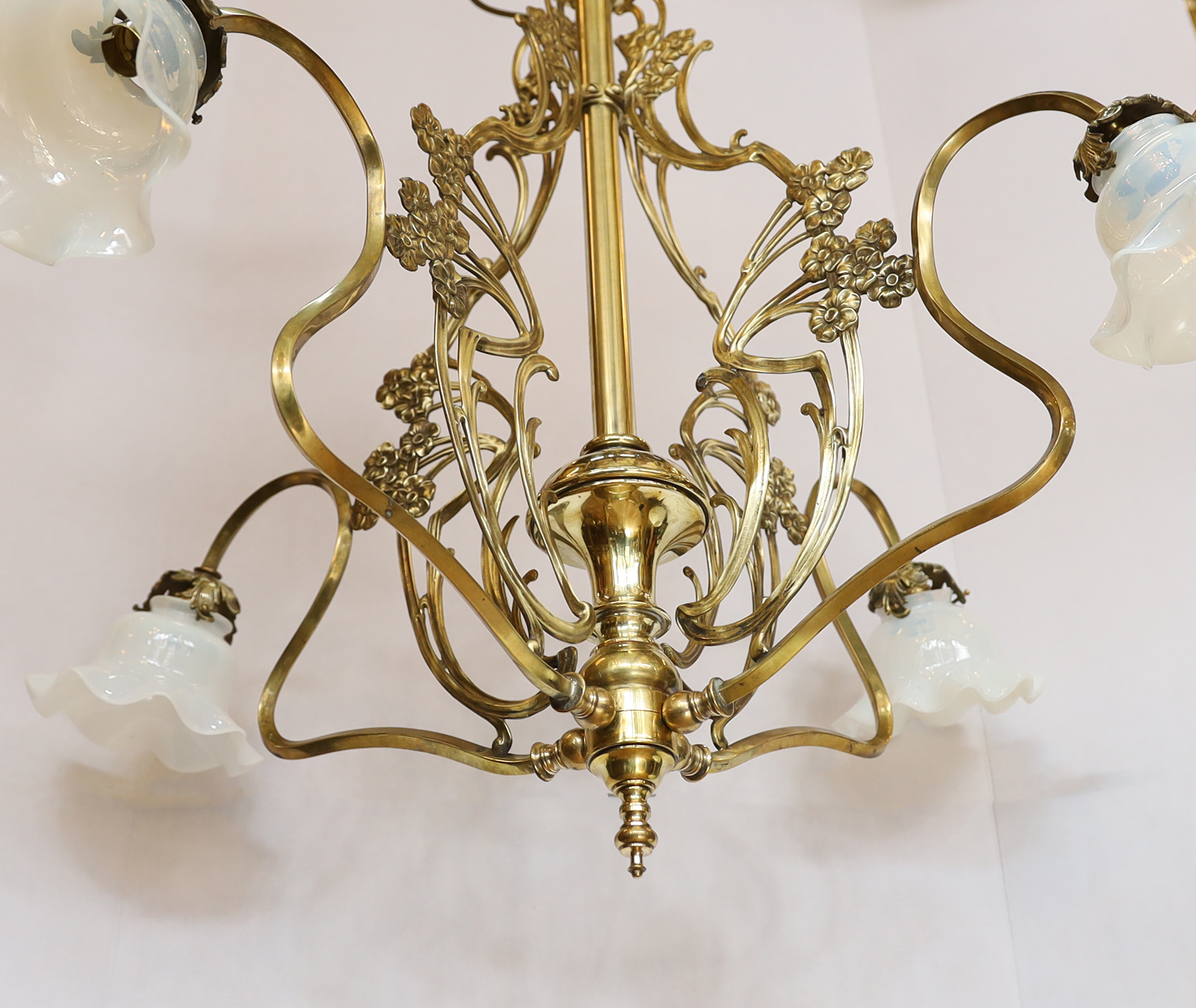 An Arts & Crafts brass four light electrolier, with vaseline glass shades, drop 80cm, width 84cm*** - Image 4 of 4