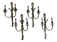 A set of four early 20th century French silvered and cast brass twin branch wall lights, width 27cm,