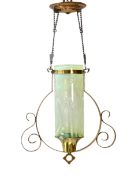 An early 20th century English Arts & Crafts adjustable brass ceiling light with cylindrical vaseline