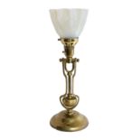 An early 20th century Scottish brass ship's gimballed desk lamp with vaseline glass shade, height