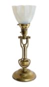 An early 20th century Scottish brass ship's gimballed desk lamp with vaseline glass shade, height