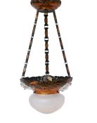 A Swiss Art Nouveau copper and frosted glass light fitting with cut decoration to the lower dome,