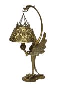 A 1930's Continental cast brass desk lamp modelled as a stylised eagle, height 51cm