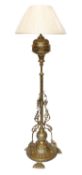 A late 19th century English brass telescopic oil lamp standard, now converted to electricity,