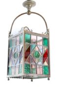 An English bronze hall lantern with leaded stained glass panels, width 20cm, height 57cm