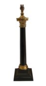 A Victorian brass and ebonised metal corinthian column table lamp, with loaded bronze base, height