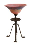 A 1950's French wrought iron table lamp with pate de verre uplighter shade, diameter 32cm, height