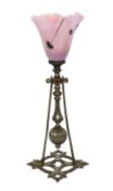 An early 20th century steel gimbal light with lustrous pink glass shade, height 31cm