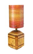A mid century English parquetry table lamp with original fibreglass shade, width 10cm, height