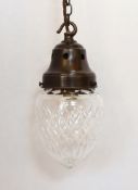 A 1920's English crystal acorn pendant, with gallery, chain and ceiling rose bronzed patination on