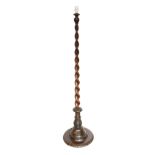 An early 20th century spiral fluted carved and stained beech lamp standard, height 155cm***CONDITION