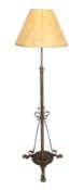 An early 20th century English brass telescopic lamp standard with recent parchment style shade,