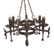 A late 19th century English wrought iron ceiling light of unusually substantial proportions, width