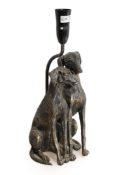 A modern bronzed resin table lamp modelled as two seated dogs, overall height 39cm***CONDITION