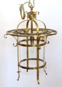 A 1920's French Arts & Crafts brass hall lantern with cylindrical glass liner, width 36cm, height