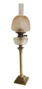 A late Victorian silver plated corinthian column oil lamp with cut glass reservoir and etched
