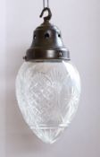 An early 20th century English cut glass light pendant with bronzed metal fitting, height 28cm