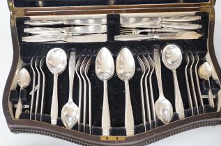 An oak canteen of plated cutlery