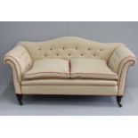 A late Victorian upholstered scroll arm two seater settee, length 176cm, depth 78cm, height 84cm