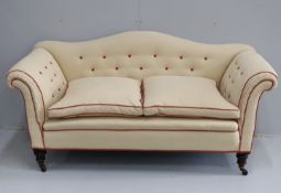 A late Victorian upholstered scroll arm two seater settee, length 176cm, depth 78cm, height 84cm