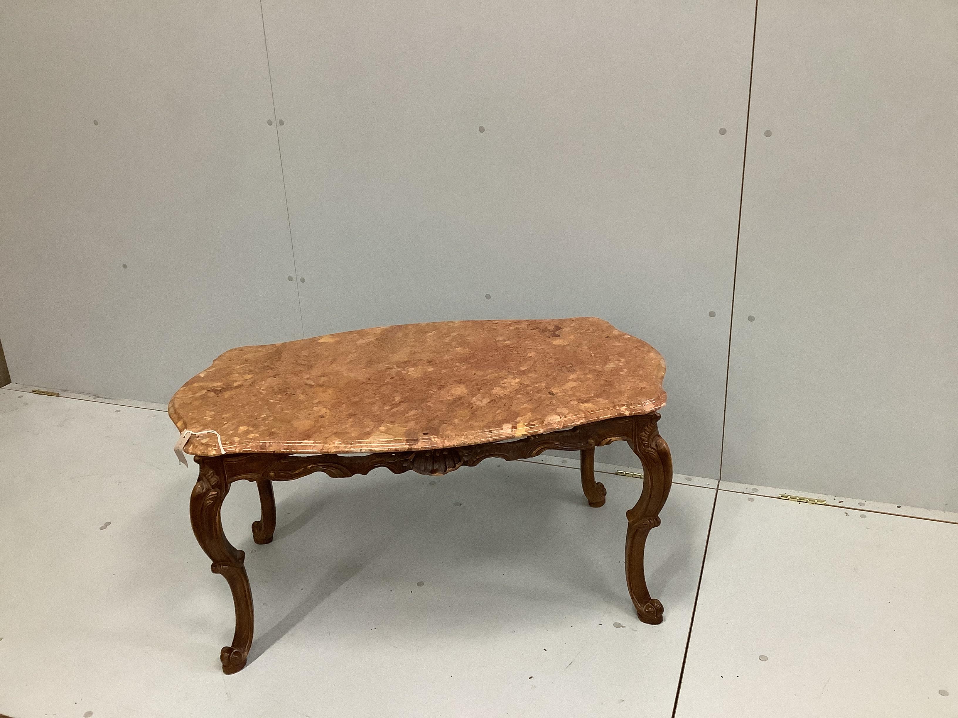 A rectangular coffee table, with shaped and moulded 'Rosso Verona' marble top, on carved cabriole