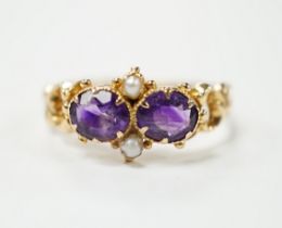 A Victorian style yellow metal, amethyst and pearl dress ring, size L