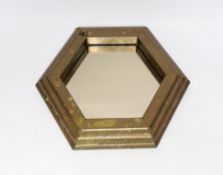 A 1970’s Rodolfo Dubarry hexagonal brass mirror or stand, signed, 26cm wide