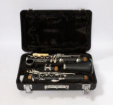 A cased Lindo clarinet