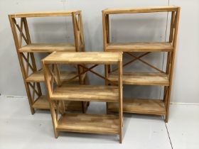 A set of three contemporary oak open bookcases in two sizes, larger width 70cm, depth 30cm, height