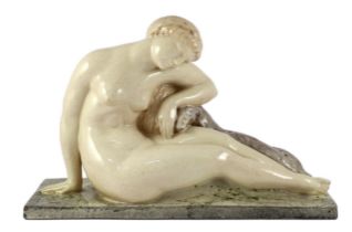 Georges Chauvel (French 1886-1962). An Art Deco ceramic figure of a sleeping Diana, signed,