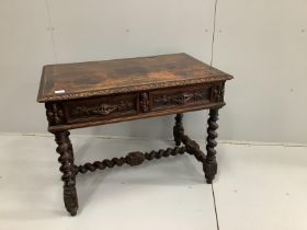 A late 19th century Flemish carved oak two drawer side table, with a barley twist under frame, width
