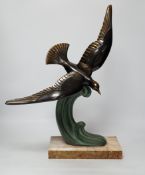 A French Art Deco bronzed and patinated metal Seagull on marble base, 51cm high