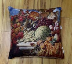 A set of six printed cushions depicting a still life scene of fruit, flowers and leaves