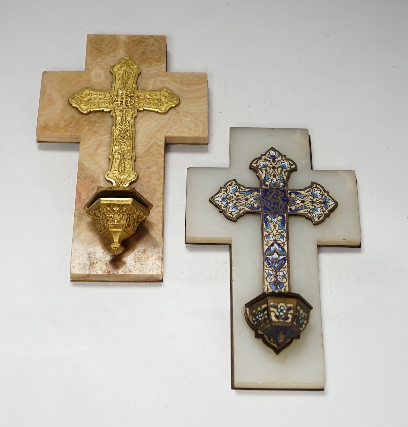 Two ‘holy water’ onyx mounted church stoups, largest 25cm high