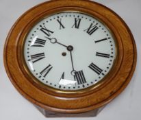 An early 20th century oak wall dial, 46cm diameter