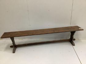 A 19th century provincial oak bench, length 200cm, depth 29cm, height 45cm