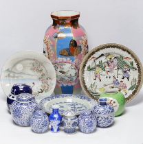 A group of Japanese and Chinese porcelain including an 18th century Chinese export dish, tallest