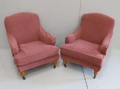 A pair of modern French upholstered armchairs, silk covered with later loose covers, width 74cm,