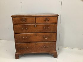 A George III oak chest of five drawers, width 100cm, depth 54cm, height 103cm