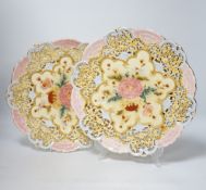 A pair of Zsolnay pierced floral and gilt decorated dishes, 31cm high