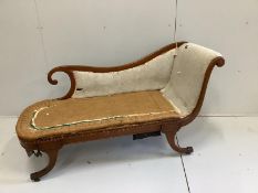 A Regency style mahogany chaise longue, length 150cm, depth 54cm, height 77cm, (needs re-