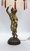 A vintage Indian polished brass figure of a dancer on lotus base, now mounted as a lamp, 80cm
