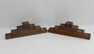 A pair of copper mounted candle holders, width 72cm, height 23cm