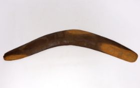 A chip carved Australian boomerang, 53cm in length
