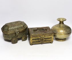 Eastern brassware to include a betel box on wheels, a vase with engraved detail and a pierced box,