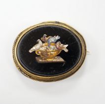 A Victorian yellow metal mounted micro-mosaic brooch decorated with Pliny doves, 3.75cm