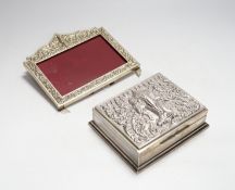 A Thai white metal cigarette box, stamped sterling, 14cm, and a similar sterling overlaid photograph