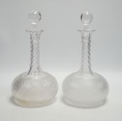 A pair of Victorian 'diamond' cut onion shaped decanters with facet cut stoppers, c.1875