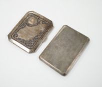 A George V engine turned silver cigarette case, 183 grams, and a Thai white metal and niello